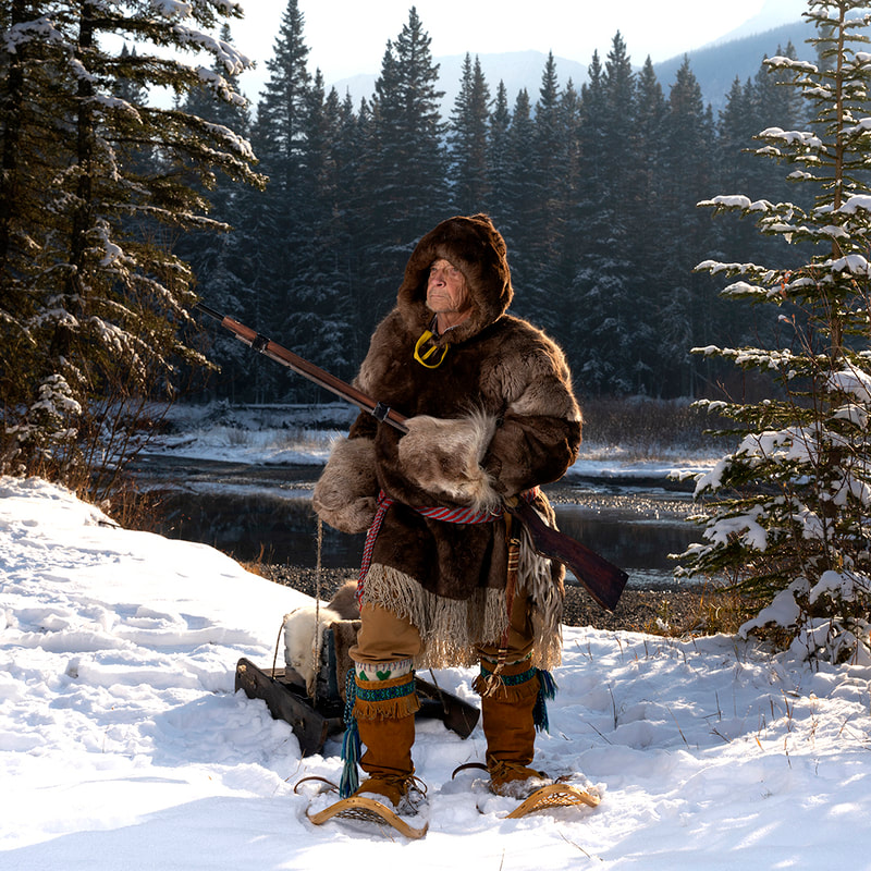 Canadian fur trapper returning from trap line.