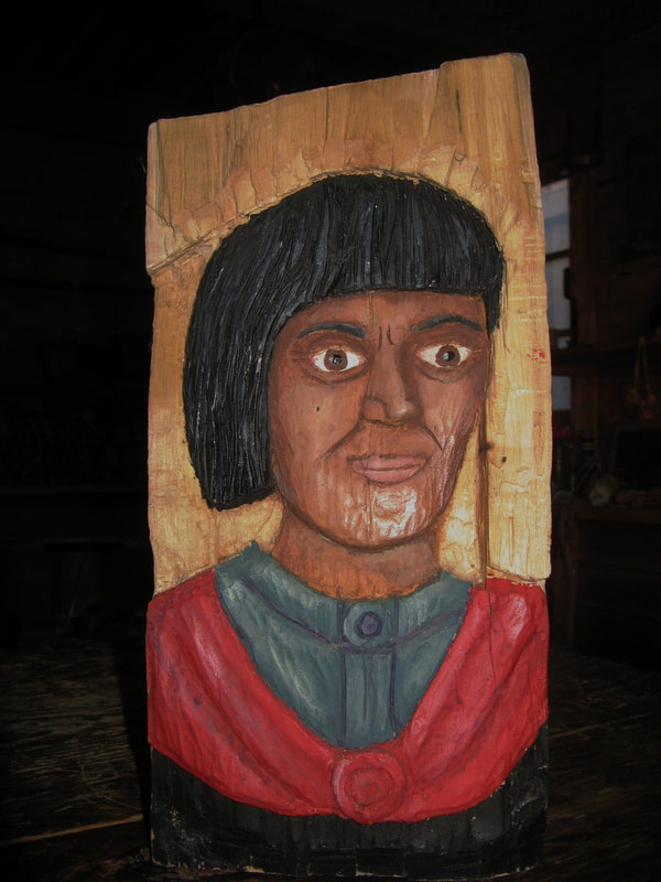 Wood carving of David Thompson, explorer and historic surveyor