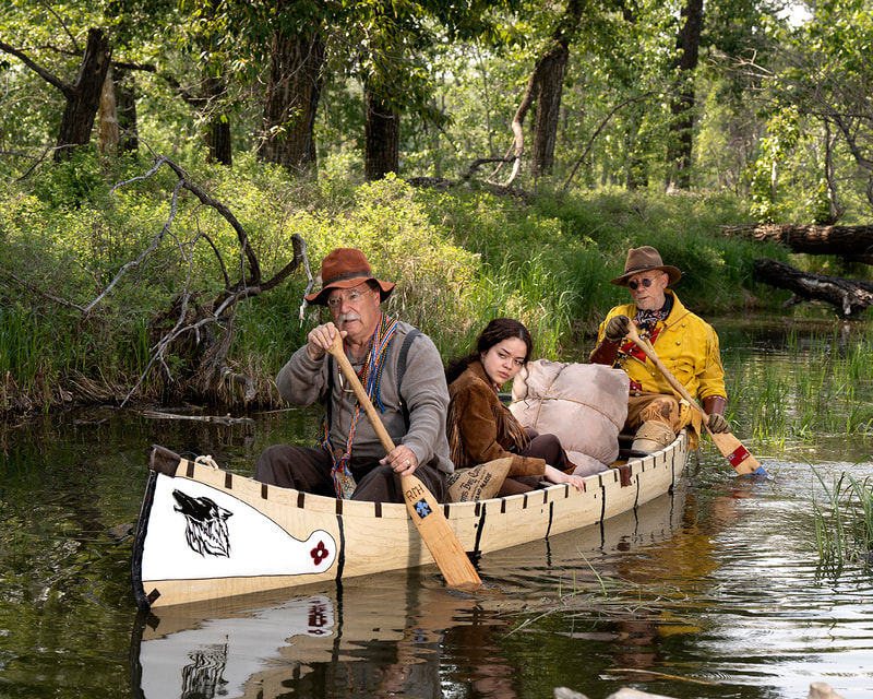 Reenactors in Birchbark canoe photographed by
Sid Dutchak Photography Calgary AB